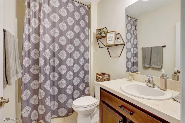 bathroom with tile patterned flooring, a shower with shower curtain, toilet, and vanity