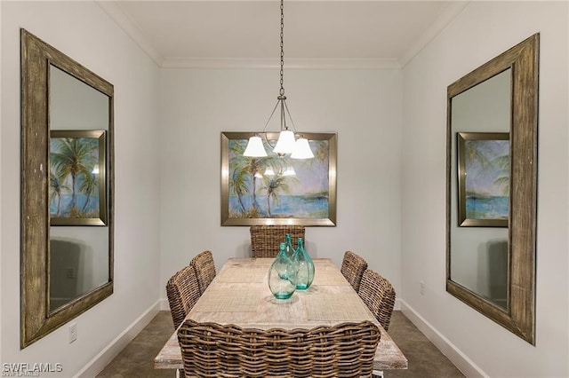 dining space with baseboards, a chandelier, and crown molding