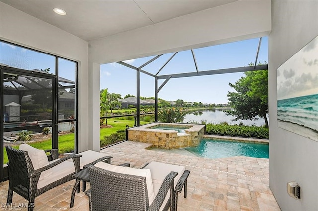 view of swimming pool with a lanai, a water view, a pool with connected hot tub, and a patio