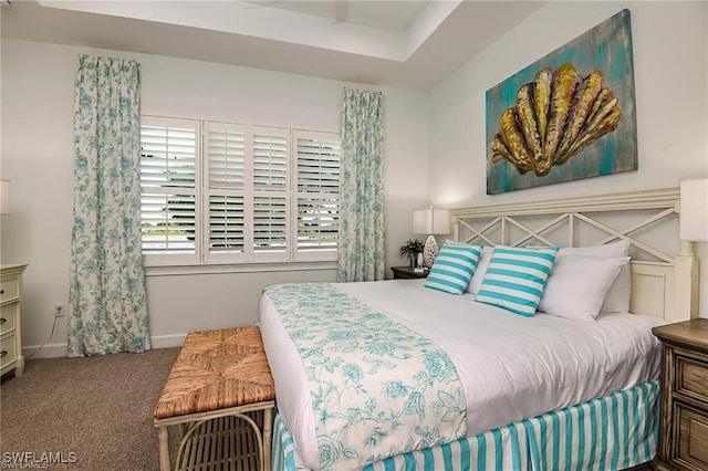 carpeted bedroom with baseboards