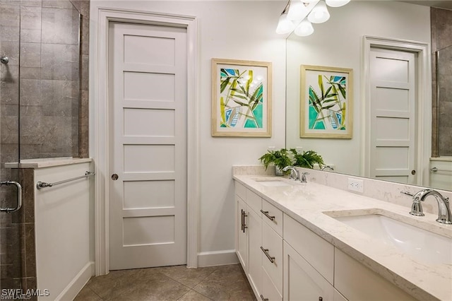 full bathroom with a sink, double vanity, tile patterned flooring, and a tile shower