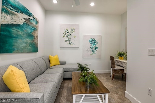 living room featuring recessed lighting, a ceiling fan, and baseboards