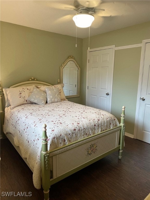 bedroom with a ceiling fan and wood finished floors