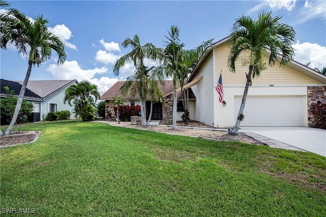 view of front facade featuring stucco siding, driveway, a front yard, and an attached garage