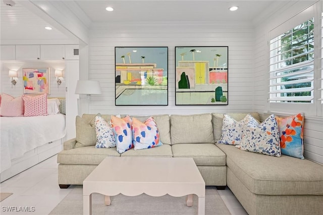 living room featuring tile patterned floors, recessed lighting, and ornamental molding