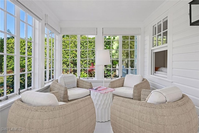 sunroom / solarium featuring plenty of natural light