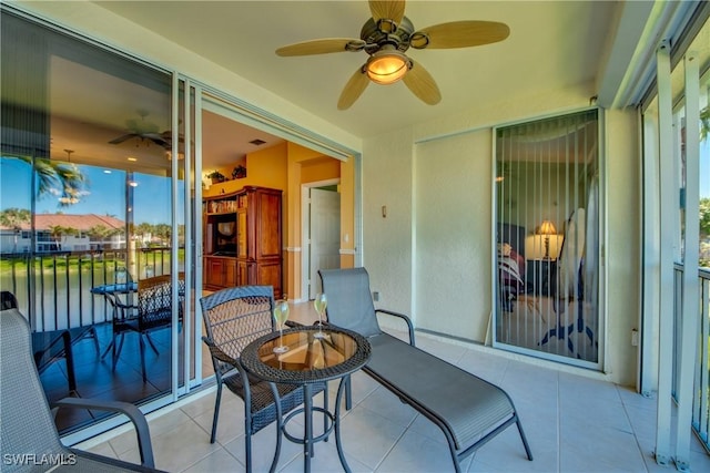 view of patio with ceiling fan