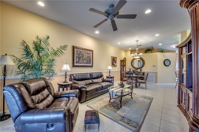 living area with light tile patterned floors, recessed lighting, and ceiling fan