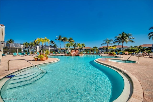 pool featuring a patio and a community hot tub