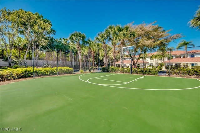 view of sport court with community basketball court and fence