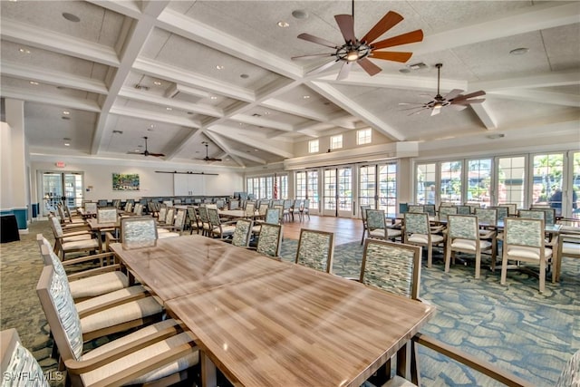 dining room featuring beamed ceiling, coffered ceiling, and carpet