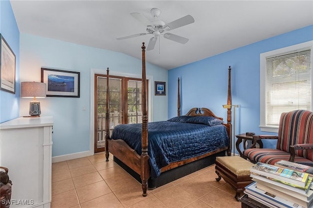 bedroom featuring lofted ceiling, a ceiling fan, light tile patterned floors, baseboards, and access to exterior