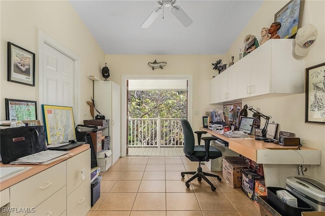 office space with light tile patterned floors and a ceiling fan