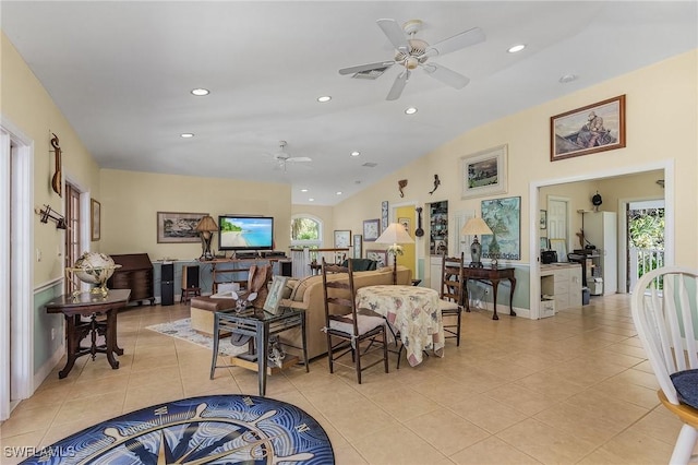 living room featuring light tile patterned floors, ceiling fan, recessed lighting, and vaulted ceiling