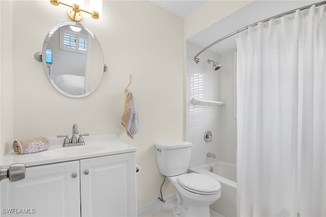 full bathroom featuring tile patterned flooring, baseboards, shower / bath combo with shower curtain, toilet, and vanity