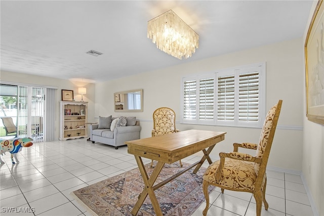 home office featuring light tile patterned floors, visible vents, baseboards, and a chandelier