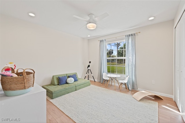 bedroom with recessed lighting, light wood-type flooring, baseboards, and ceiling fan