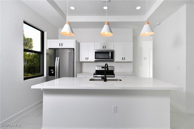2810 64th St W, Lehigh Acres, FL 33971 - kitchen with light countertops, decorative light fixtures, stainless steel appliances, a sink, and white cabinets