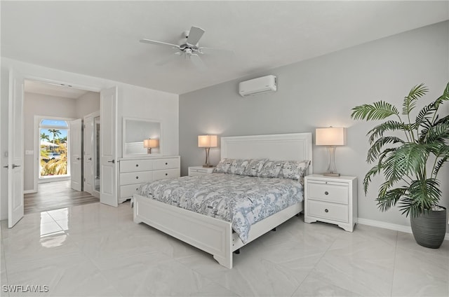 bedroom featuring a wall mounted AC, baseboards, ceiling fan, and light marble finish flooring
