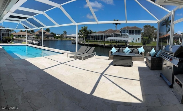 swimming pool with a patio area, a water view, and glass enclosure