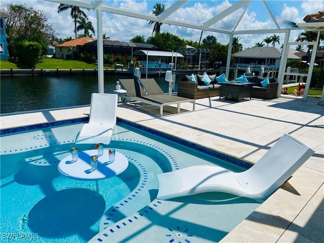 swimming pool with an outdoor hangout area, a water view, a patio, and a lanai