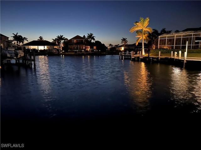 water view featuring a dock