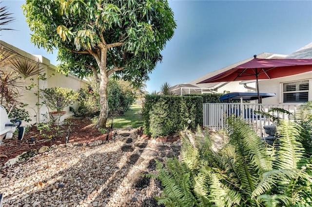 view of yard featuring fence