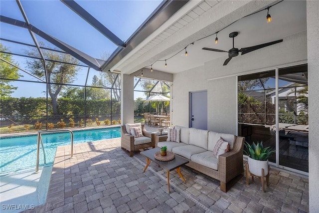 exterior space with outdoor dining space, a lanai, an outdoor pool, an outdoor hangout area, and ceiling fan