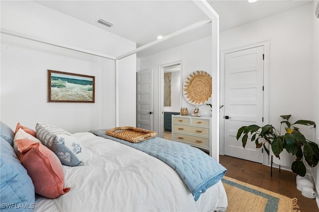 bedroom featuring recessed lighting, visible vents, and wood finished floors