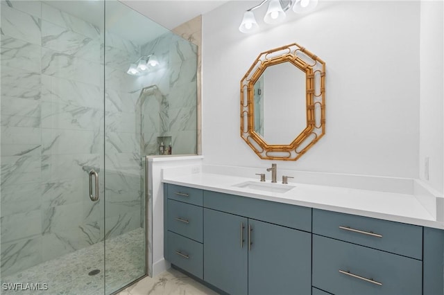 full bathroom with a marble finish shower, marble finish floor, and vanity