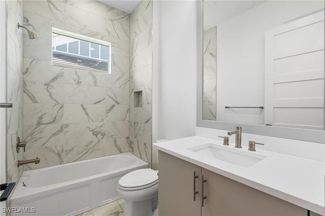 bathroom with vanity, toilet, tub / shower combination, and marble finish floor