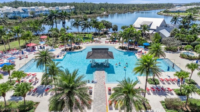 view of pool featuring a water view