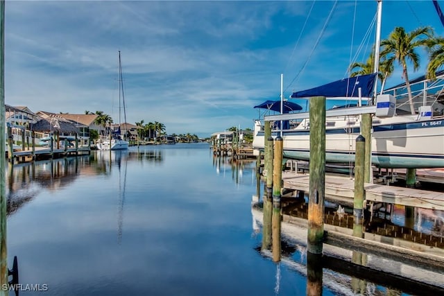 dock area featuring a water view and boat lift