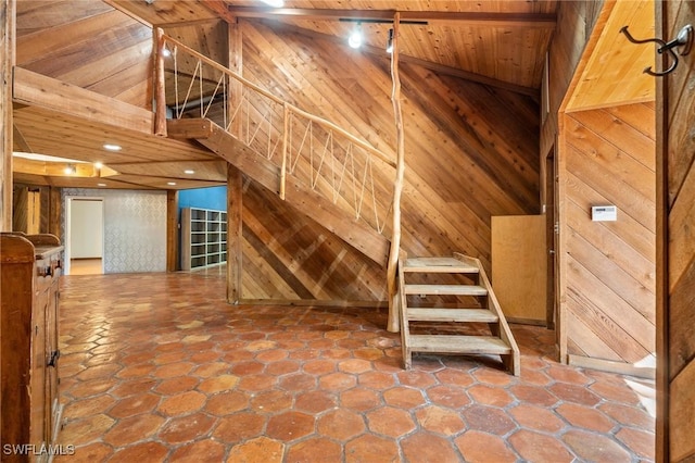 3775 27th Ave SW, Naples, FL 34117 - staircase featuring wood walls, lofted ceiling, and wooden ceiling