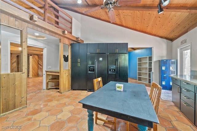 3775 27th Ave SW, Naples, FL 34117 - kitchen with wood ceiling, a ceiling fan, black fridge with ice dispenser, beam ceiling, and high vaulted ceiling