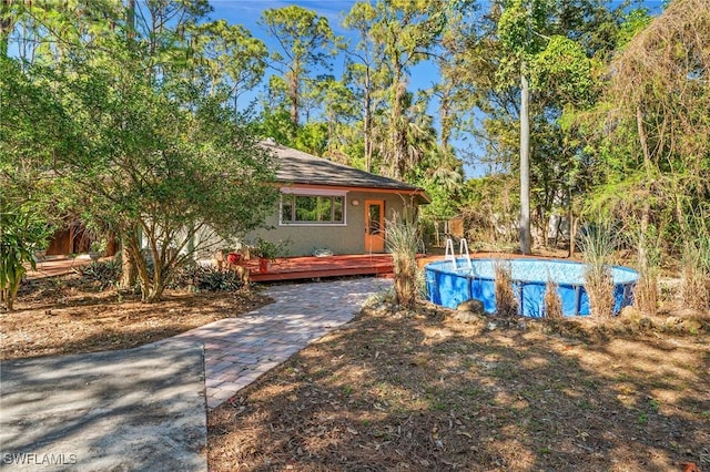 3775 27th Ave SW, Naples, FL 34117 - swimming pool with a wooden deck