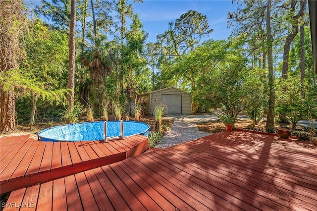 3775 27th Ave SW, Naples, FL 34117 - view of pool with a shed, an outdoor structure, and a deck