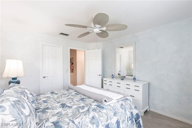 183 Old Tamiami Trl, Naples, FL 34110 - bedroom featuring light carpet, ceiling fan, and baseboards
