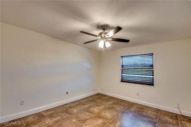 17225 Castleview Dr, North Fort Myers, FL 33917 - tiled spare room featuring baseboards and ceiling fan