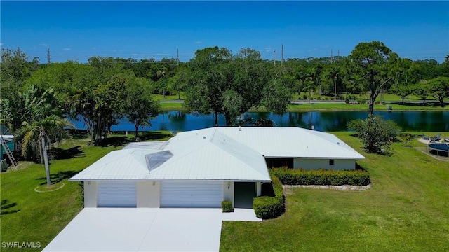 exterior space with a water view