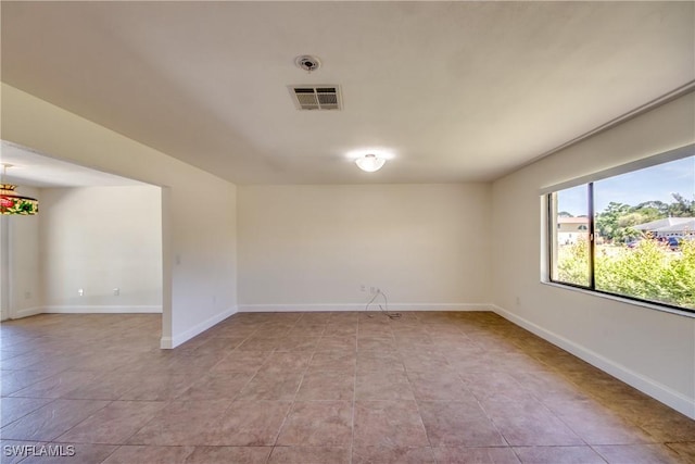 17225 Castleview Dr, North Fort Myers, FL 33917 - unfurnished room with baseboards and visible vents
