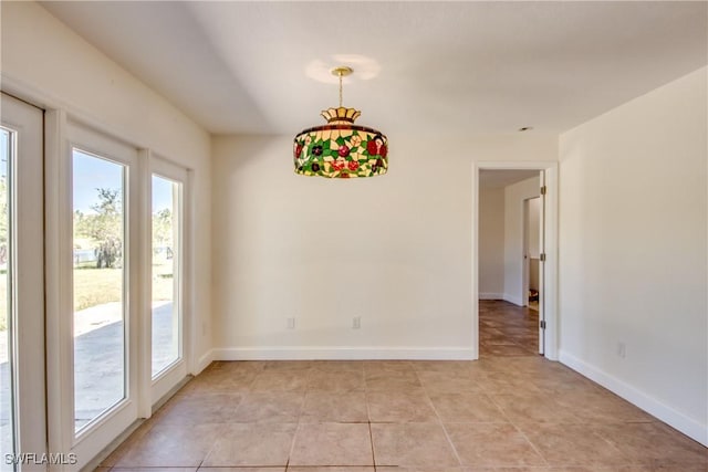 17225 Castleview Dr, North Fort Myers, FL 33917 - spare room featuring light tile patterned flooring and baseboards
