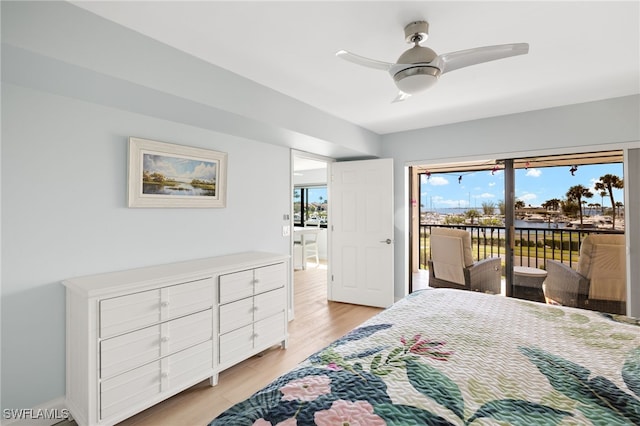 bedroom with light wood-style flooring, ceiling fan, and access to outside