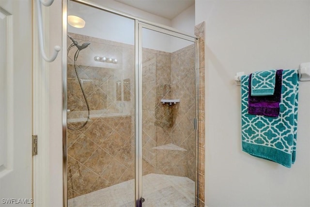 full bathroom with a stall shower