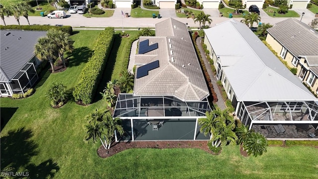 birds eye view of property with a residential view