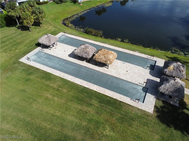 birds eye view of property featuring a water view