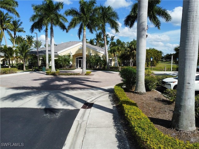 view of road featuring sidewalks and curbs