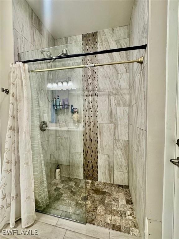 full bathroom with a stall shower