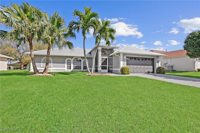 ranch-style house featuring a garage, driveway, central AC, and a front lawn