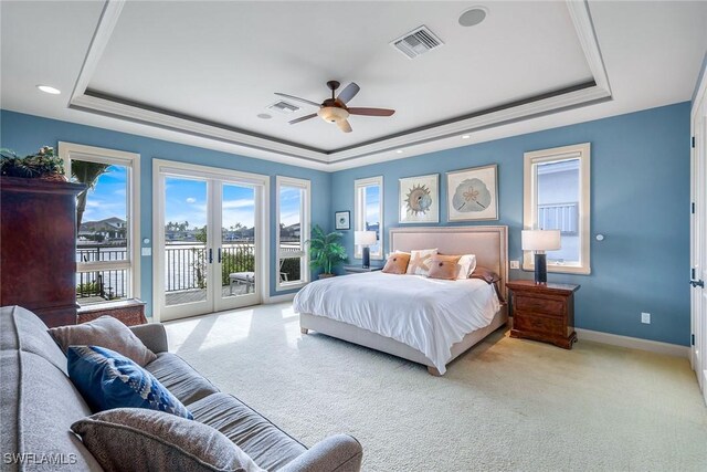 940 Tulip Ct, Marco Island, FL 34145 - bedroom featuring visible vents, baseboards, carpet flooring, a raised ceiling, and access to outside